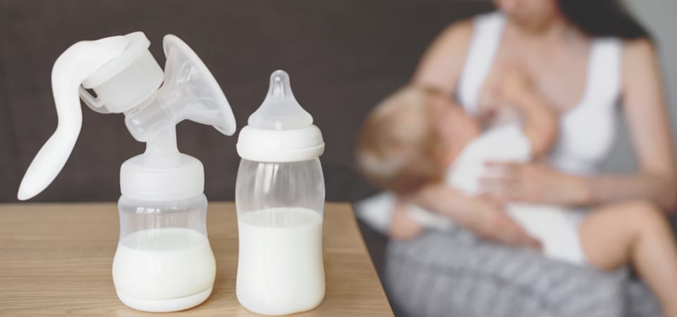 mother feeding baby