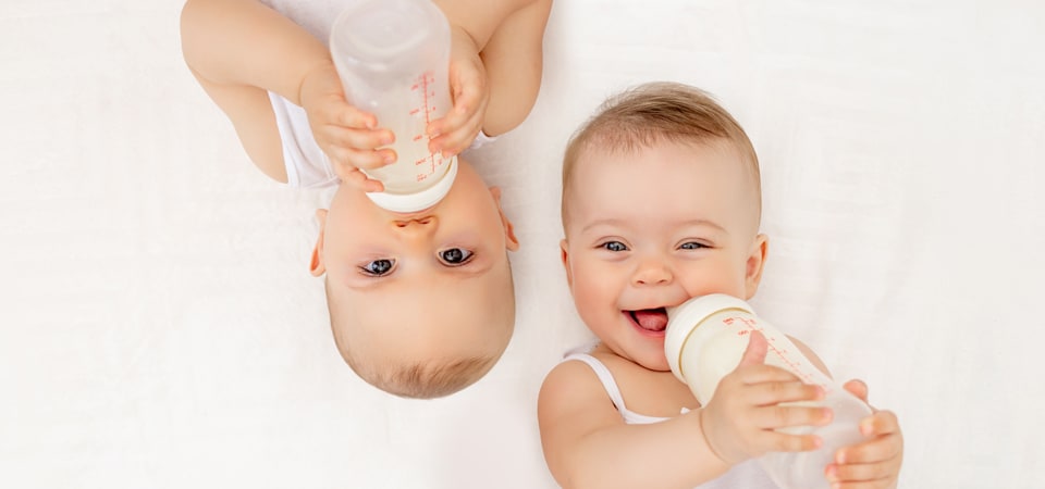 Babies drinking milk