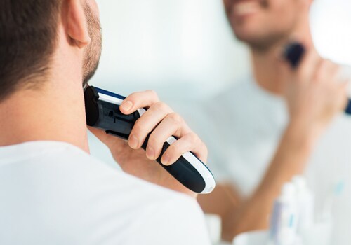 men shaving beard